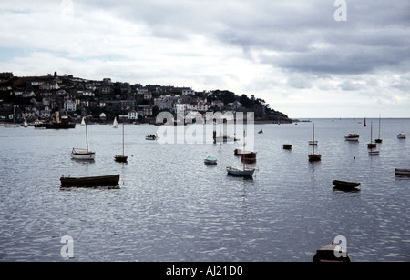 lots of boats in the sea, hillsides behind Stock Photo