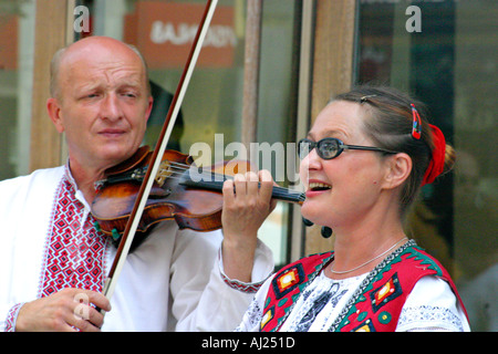 Russian street performers in Spain violin player and singer Stock Photo