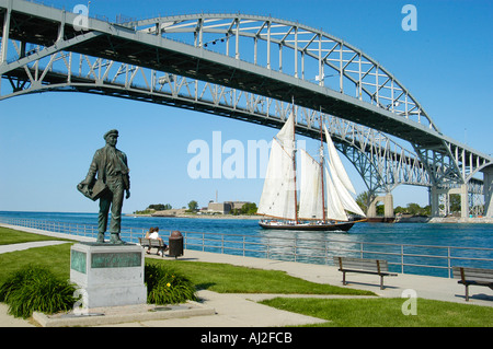 Tall Ship Highlander Sails Under Blue Water International Bridge Port Huron Michigan Stock Photo