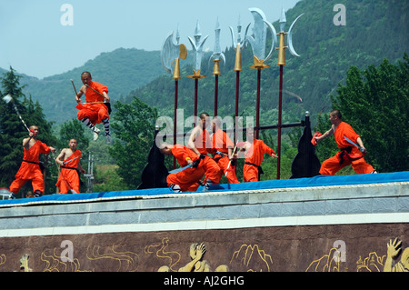 Kung Fu students displaying their skills at a tourist show within Shaolin Temple, Henan Province, China. Stock Photo