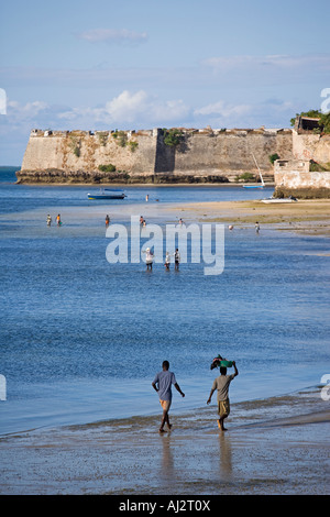 The beach leads up to the heavily fortified walls of the Forteleza de Sao Sebastao guarding the nothern tip Stock Photo