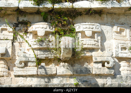 Decorative Carved Head of Chaac Rain God and Comic Big Nose The Nunnery Monjas Building Chichen Itza Yucatan Mexico 2007 NR Stock Photo