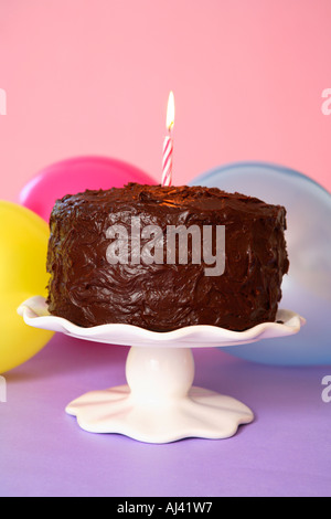 Chocolate Birthday Cake with single candle Stock Photo