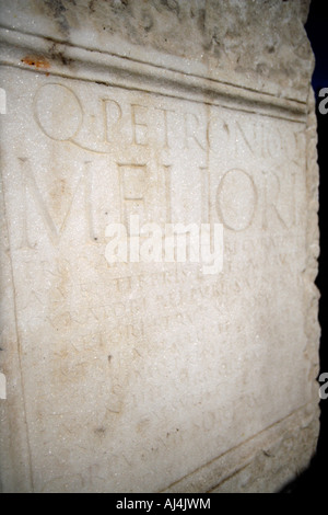 Dedicatory Latin Inscription On Stone, Ancient Roman Port Of Ostia, Italy Stock Photo