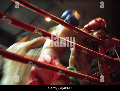 A referee intervenes in a Khmer kickboxing match Phnom Penh Cambodia Stock Photo