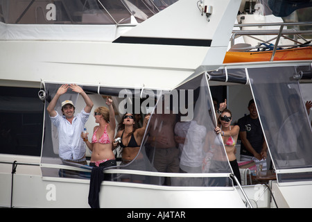 People having a party on a cruse boat in Sydney harbour New South Wales NSW Australia Stock Photo