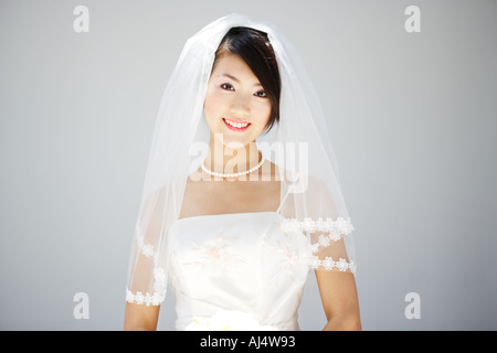 Bride looking at camera Stock Photo