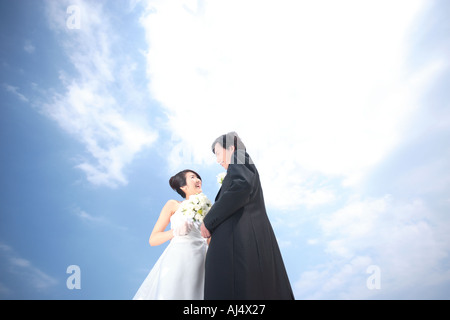 Bride and groom looking at each other Stock Photo
