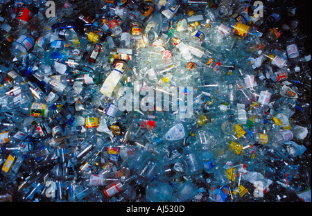 discarded glass in a recycling bin Stock Photo