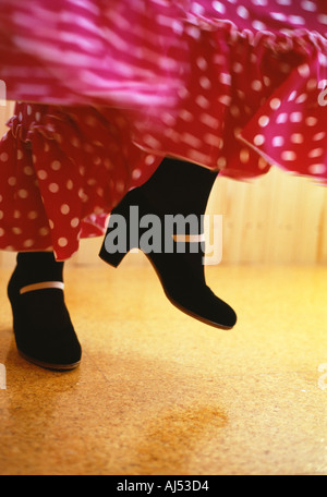 Flamenco movements feet and swirling skirt Spain Stock Photo