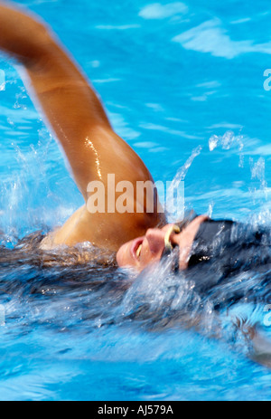 Female freestyle swimmer in motion Stock Photo