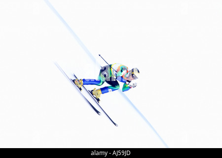 Skier hurtles down race course during a world cup in val d isere French Alps Stock Photo