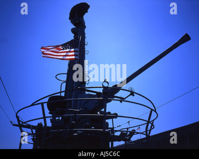 The cannon and conning tower of the USS Pampanito the WWII American submarine now moored in San Francisco Stock Photo