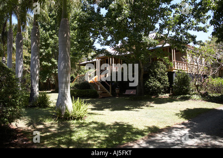 Exterior of old colonial style Queenslander wooden house building with gardens in Dakabin Queensland QLD Australia Stock Photo