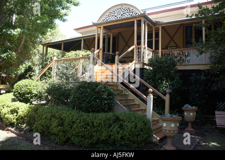 Exterior of old colonial style Queenslander wooden house building with gardens in Dakabin Queensland QLD Australia Stock Photo