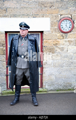 1940s SS Officer Nazis, World War Two German Army Officer Uniform . 20th Century Re-enactment groups Pickering Wartime Weekend Railway Station Clock Stock Photo