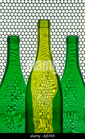 Three empty wine bottles on white background Stock Photo - Alamy