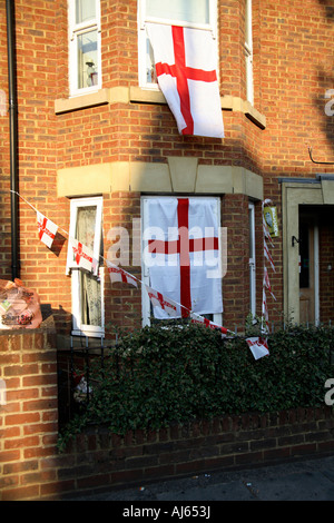 Cross of St. George flags hanging from houses, Goldhawk Road, west London, 2006 World Cup Finals Stock Photo