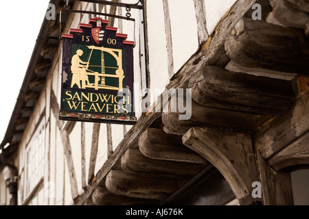 UK Kent Sandwich Strand Street the Weavers sign on historic medieval timber framed refugee Flemish weavers house Stock Photo