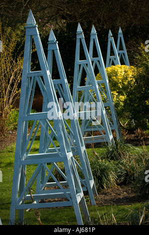 Borde Hill gardens: obelisks for climbing plants in the famous gardens. Picture by Jim Holden. Stock Photo