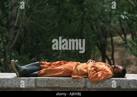asleep iranian garbage-man, Iran Stock Photo