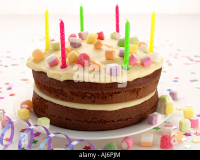 Childrens birthday cake with candles Stock Photo