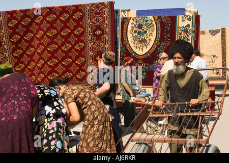 Carpet market in the Tolkucha bazar, Ashgabat (Asgabat), Turkmenistan Stock Photo