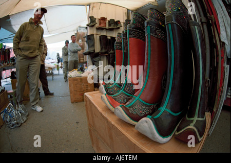 Mongolian national boots gutuls. Khovd city public market. Mongolia Stock Photo