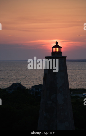 Lighthouse at sunset on Bald Head Island North Carolina Stock Photo