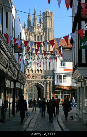 canterbury cathedral entrance high street narrow lanes with shoppers town centre kent england uk gb Stock Photo