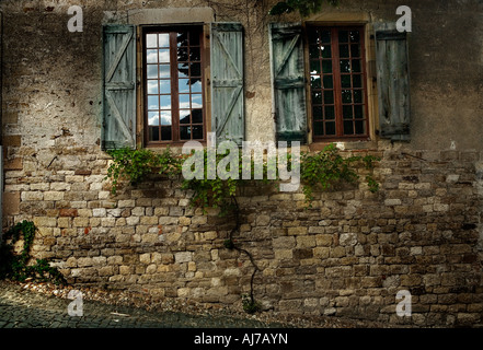 two windows in a old house in France Stock Photo