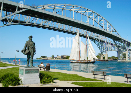 The Tall Ship Highlander passes under Blue Water International Bridge Port Huron Michigan Stock Photo