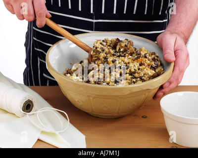 Mixing the ingredients for a christmas pudding in a bowl Stock Photo