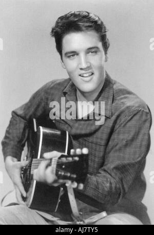 American singer and actor Elvis Presley with a fan, USA 1950s Stock ...