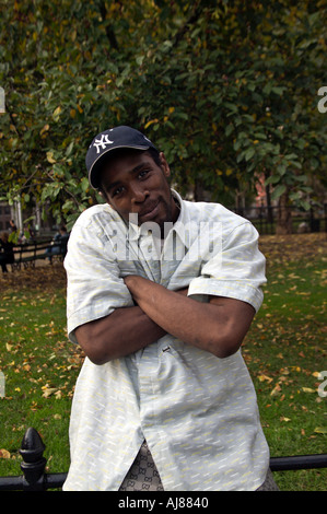African American man hanging out at Washington Square Park New York NY no model release editorial useage only Stock Photo