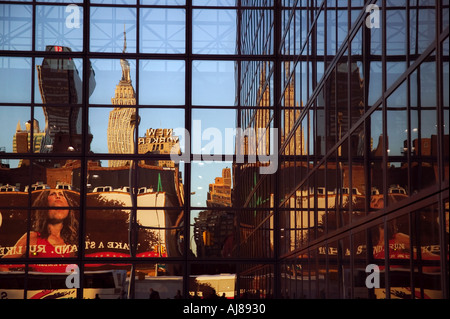 Empire State Building along with portion of NYC skyline reflected in the glass surface of the Javits Convention Center New York Stock Photo