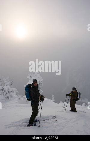 Young couple ski-tour in mountains Stock Photo