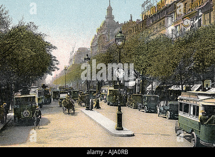 Boulevard des Italiens, Paris, with cars and motor buses on the street, c1900. Artist: Unknown Stock Photo