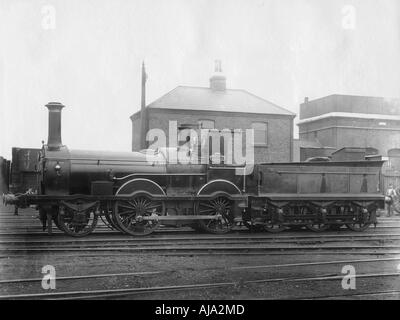London & South Western Railway (LSWR) Locomotive No 148, 'Colne' with its tender, c1880. Artist: Unknown Stock Photo