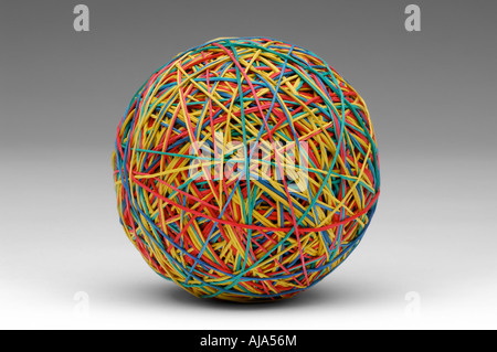 Rubber band ball on grey background Stock Photo