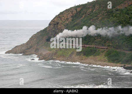 Outeniqua Choo Tjoe steam train entering tunnel Western Cape South Africa Stock Photo