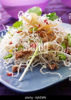 A plate of Thai Mee Krob Vermicelli noodles with sweet and sour sauce Stock Photo