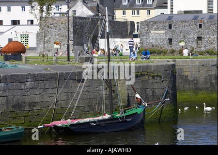hooker fishing boat at anchor in Claddagh harbour Galway city county Galway Republic of Ireland Stock Photo