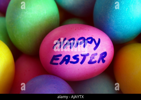 These freshly dyed, colorful eggs are easily recognizable as an Easter subject, & were the perfect medium to wish a HAPPY EASTER Stock Photo