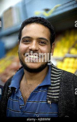 Young man smiling at night in Mohandiseen area Cairo Egypt Africa Stock Photo