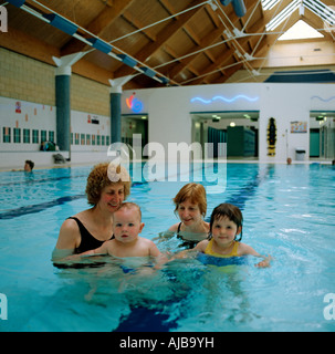 Toddler playing by the children pool Stock Photo - Alamy