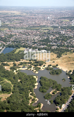 Aerial view east of Snaresbrook Crown Court Hollow Pond Boating Lake suburban housing London E11 UK High level oblique Stock Photo