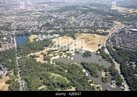 Aerial view east of Snaresbrook Crown Court Hollow Pond Boating Lake Green Man Roundabout London E11 UK High level oblique Stock Photo