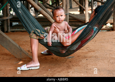 Mother and child at the village of Kompong Phhluk, Tonle Sap, Nr Siem Reap, Cambodia. Stock Photo