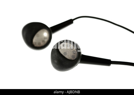 Earphones on white background - selective focus Stock Photo